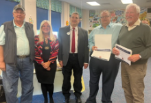 ESCWR Governing Board Members, Superintendent, Jennifer Felker, and Northeast Regional Manager for the Ohio School Boards Association, Mr. Reno Contipelli