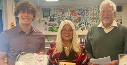 Cameron Simpson, Lake County Franklin B. Walter All-Scholastic Award winner pictured with the ESCWR Governing Board President, Mr. Geoffrey Kent, and Superintendent, Mrs. Jennifer Felker. 